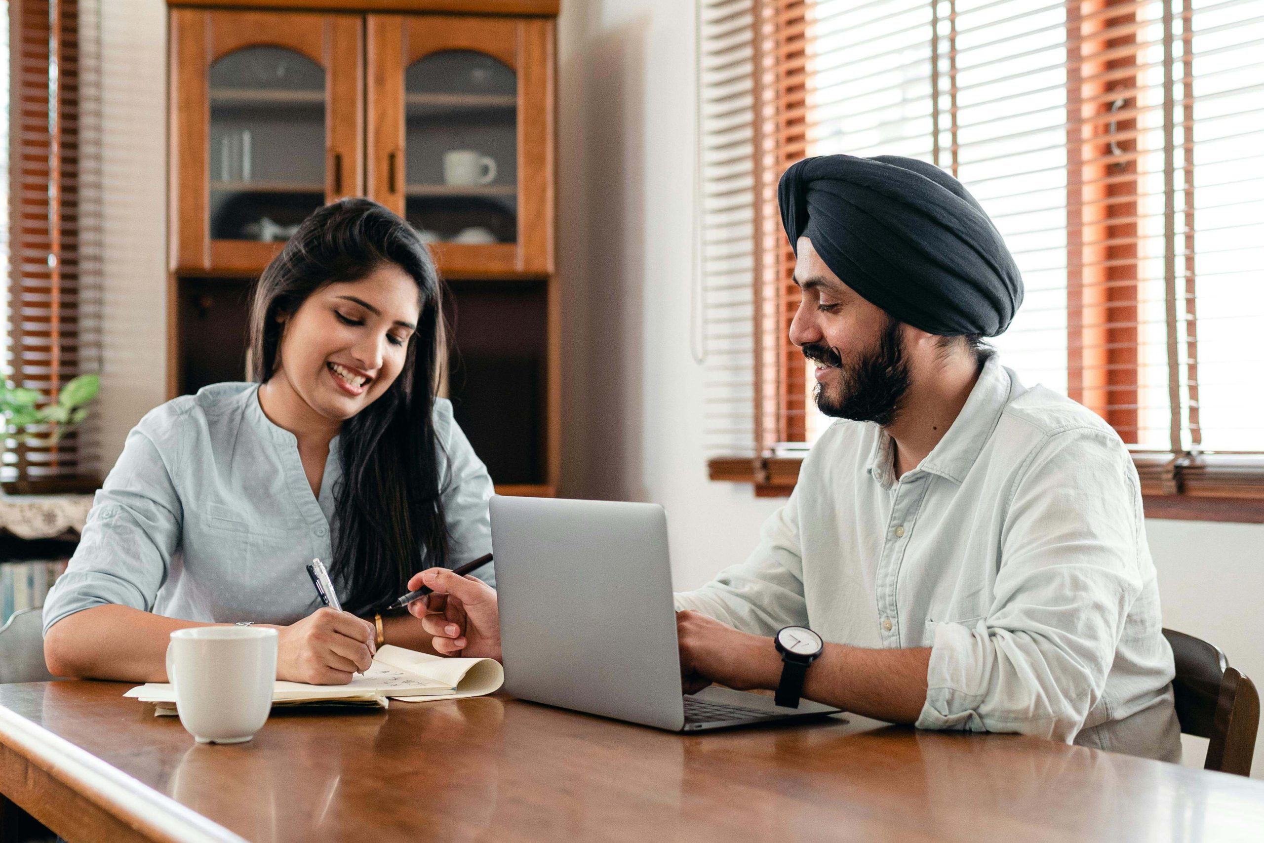 Small business owner using a phone to connect with customers